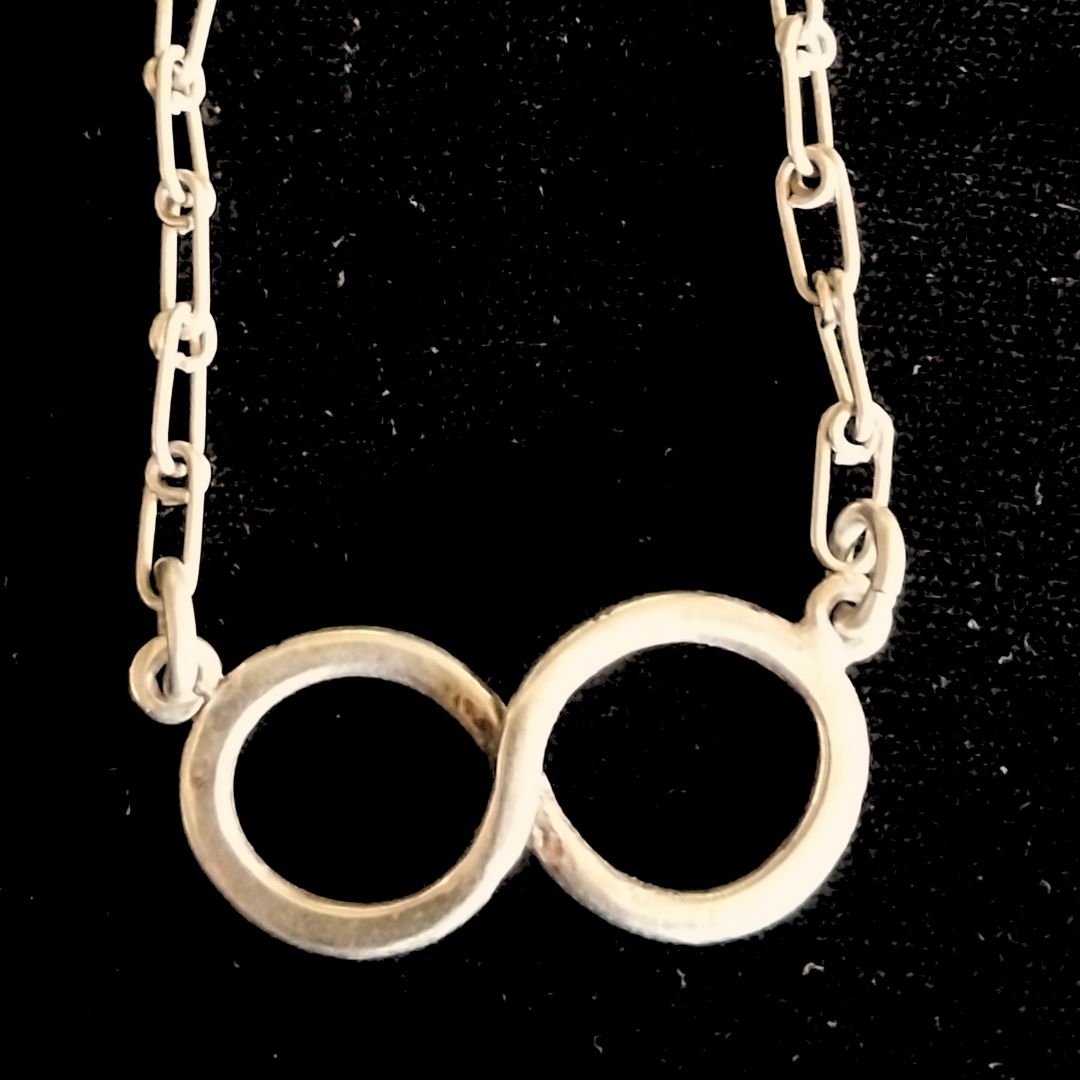 Colgante Infinito en Alpaca con Cadena 60cm